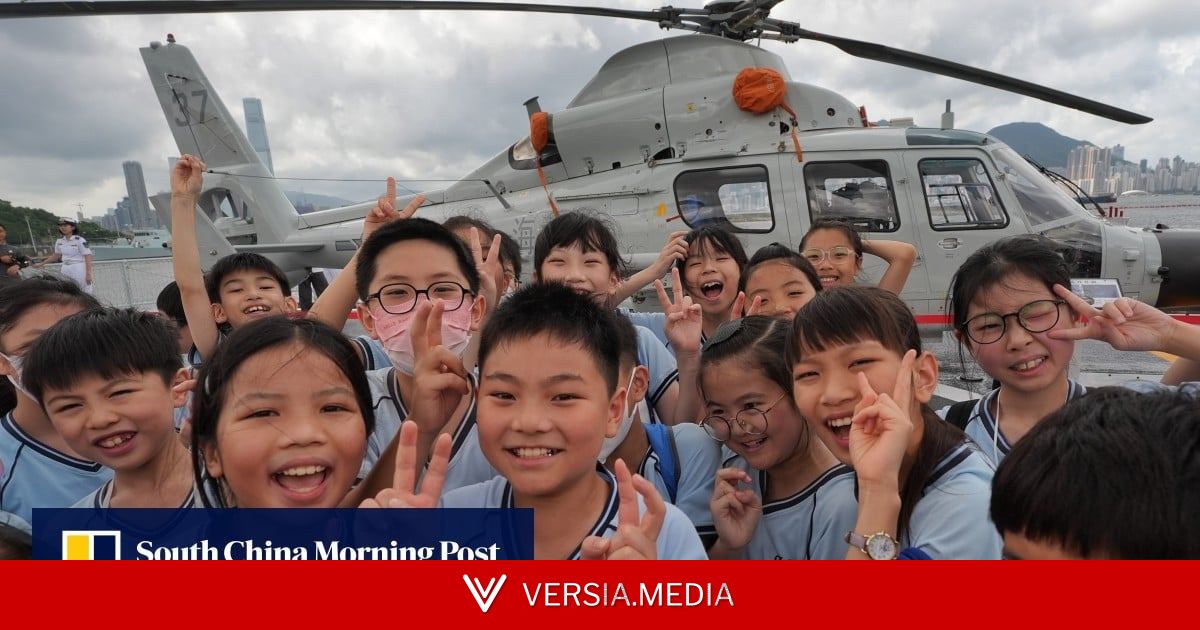 Hong Kong students tour PLA Navy warships for lesson on national defence