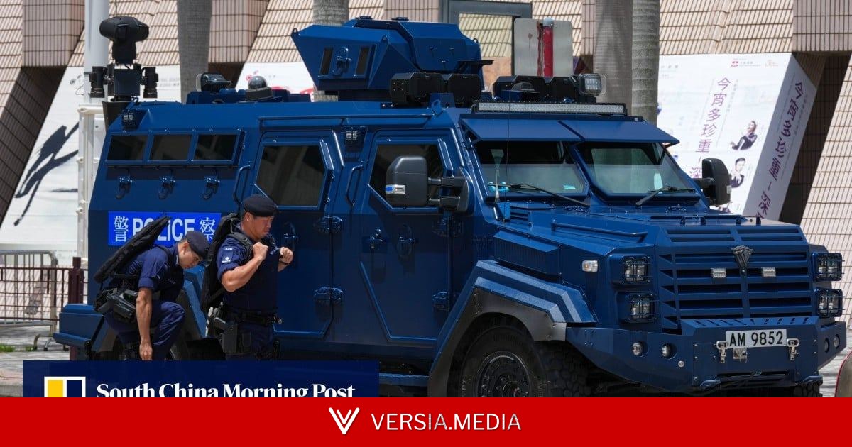 Hong Kong police search 15 in former July 1 protest areas, man taken away